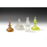 Four cut glass scent bottles and stoppers late 19th/early 20th century, one of uranium glass and a