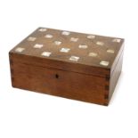 An English Walnut box and cover inlaid with mother of pearl probably by Ernest Gimson, rectangular