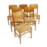 A set of six Robert Mouseman Thompson oak chairs, with leather pad seats, each carved with mouse