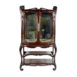 A large and impressive Art Nouveau mahogany display vitrine and stand in the manner of Emile