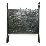 A polished steel firescreen the designed attributed to John Williams, the rectangular panel hammered