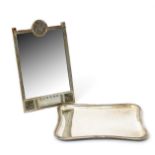 A W.M.F. Secessionist electroplated table mirror, rectangular section with easel back, cast in low