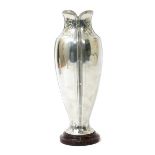 A Christofle polished pewter vase, slender, shouldered from, cast with simple blackberry flower