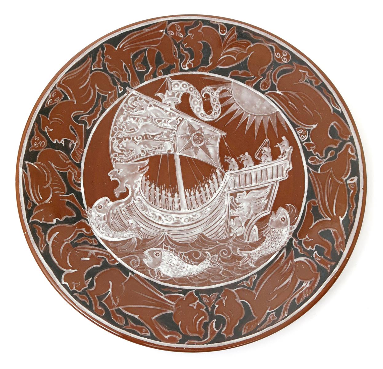 An unusual pottery charger probably by John Pearson, painted with a manned galleon at full sail with