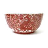A large William De Morgan bowl, painted with a frieze of displaying peacocks, in ruby and golden