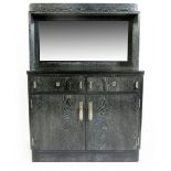 A continental Secessionist limed and ebonised oak sideboard, rectangular form with enclosing mantle,