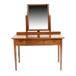 A cherry dressing table and mirror designed by Edward Barnsley, three drawer construction, with