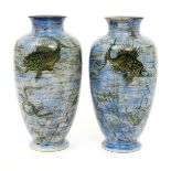 A fine pair of Martin Brothers stoneware Aquatic vases by Edwin & Walter Martin, dated 1909,