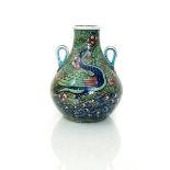 A large Burmantofts Faience Anglo-Persian vase by Leonard King, model DS9-94, swollen form with