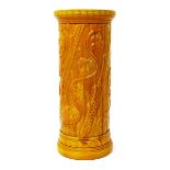 A Burmantofts Faience stick-stand, model no.808, cylindrical with flaring rim, cast in relief with