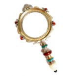 λ A Renaissance revival gilt and silvered metal magnifying glass, the circular glass within a beaded