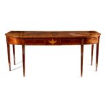 A George III mahogany breakfront serving table, the kingwood crossbanded top with radiating