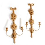 A pair of 18th century style carved wood twin-light wall appliques, each with a ribbon tied