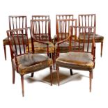 A set of eight Regency mahogany dining chairs, each with a moulded back with reeded vertical