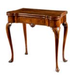 A George II walnut concertina action card table, the hinged fold-over top with protruding front