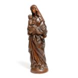 A 19th century carved oak group of the Madonna and child, possibly Dutch or German, 50cm high.
