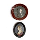 Two wax portrait relief busts, one of a gentleman in a glazed mahogany frame, the other of a lady,