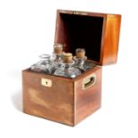 A Victorian mahogany Campaign decanter box, the hinged lid inset with a brass plaque and