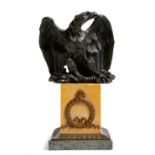 A 19th century French bronze Grand Tour model of an eagle, on a Siena marble plinth applied with a