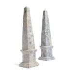 Two similar mottled grey marble Grand Tour models of obelisks, 32.3cm high. (2)