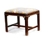 A mahogany Chinese Chippendale style stool, with a drop-in seat on blind fret carved chamfered