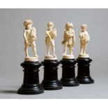 λ A set of four 19th century French Dieppe carved ivory figures, emblematic of the four seasons,