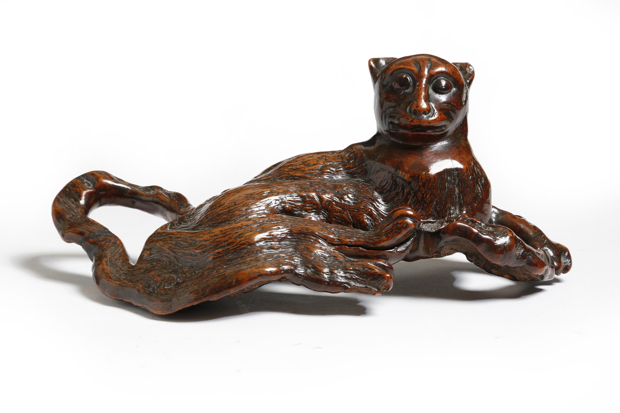 A Japanese rootwood carving of a recumbent cat, late 19th / early 20th century, 33cm long. - Image 2 of 2