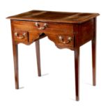 A George III mahogany lowboy, fitted with three drawers and inlaid with barber's pole stringing,