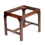 A George III mahogany stool, with chamfered legs united by an 'H' stretcher (lacking seat), 43.6cm