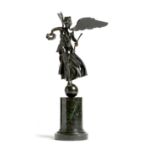 A late 19th century bronze model of Victory, standing on an orb and holding a laurel wreath, on a