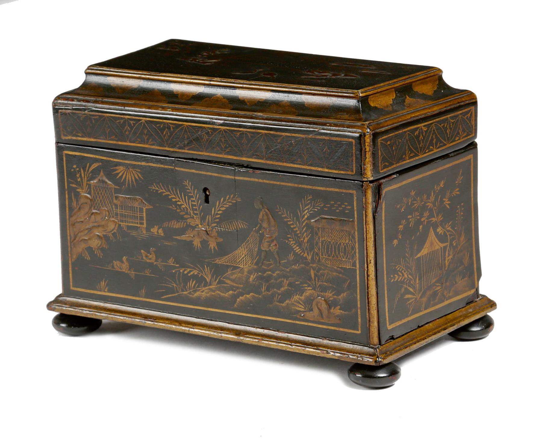 A black japanned tea caddy, decorated in gilt with part raised decoration with chinoiserie scenes,