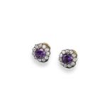 A pair of amethyst and diamond cluster earrings, each circular-cut amethyst set with eleven old