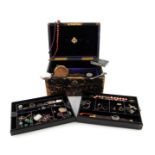 A leather jewellery box by Fischer with two removable sectioned trays and Bramah lock and containing