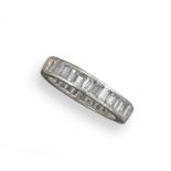 A diamond full circle eternity ring, set with baguette-shaped diamonds in platinum. Size P.