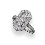 An Art Deco style ring, set with a line of three circular-cut diamonds within a border of smaller-