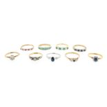 Nine gem-set gold rings, including: a diamond solitaire ring, set in yellow gold size L 1/2. A