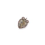 An early 19th century garnet set mourning pendant, the central locket section with hair within a