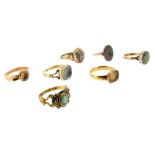 Seven antique rings, three gold rings set with a topaz, rock crystal and citrines, a gold glazed