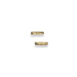 A pair of 18ct textured yellow gold rings by Kutchinsky, signed to the inner shank, with London