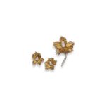 A diamond-set 18ct gold floral brooch with matching earrings by Kutchinsky, the 18ct yellow gold