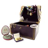 A leather jewellery casket with Bramah lock containing various items of jewellery, including a