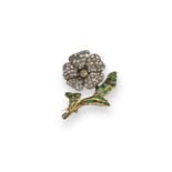 A 19th century emerald and diamond flower brooch, the petals are pave-set with rose-cut diamonds