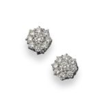 A pair of diamond cluster earrings, each earring set with nine round brilliant-cut diamonds and