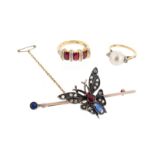 A Victorian silver and gold butterfly bar brooch, the butterfly set with diamond wings and a ruby