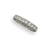 A diamond full circle eternity ring, round brilliant-cut diamonds are set in platinum. Size M.