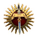 A 9ct gold military brooch, the emblem depicting a sun centred with a crown and sword with enamel