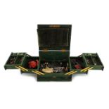 A green leather jewellery box with Bramah lock and hinged opening trays (broken), including a 19th-