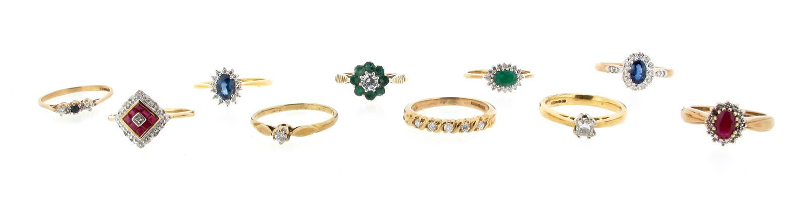 Ten gem-set gold rings, including two diamond solitaire rings, two sapphire and diamond cluster