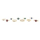 Ten gem-set gold rings, including two diamond solitaire rings, two sapphire and diamond cluster