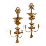 A large pair of giltwood twin light wall appliques in Regency style, each with a ribbon tied